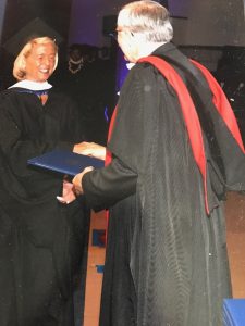Anastasia receiving her degree